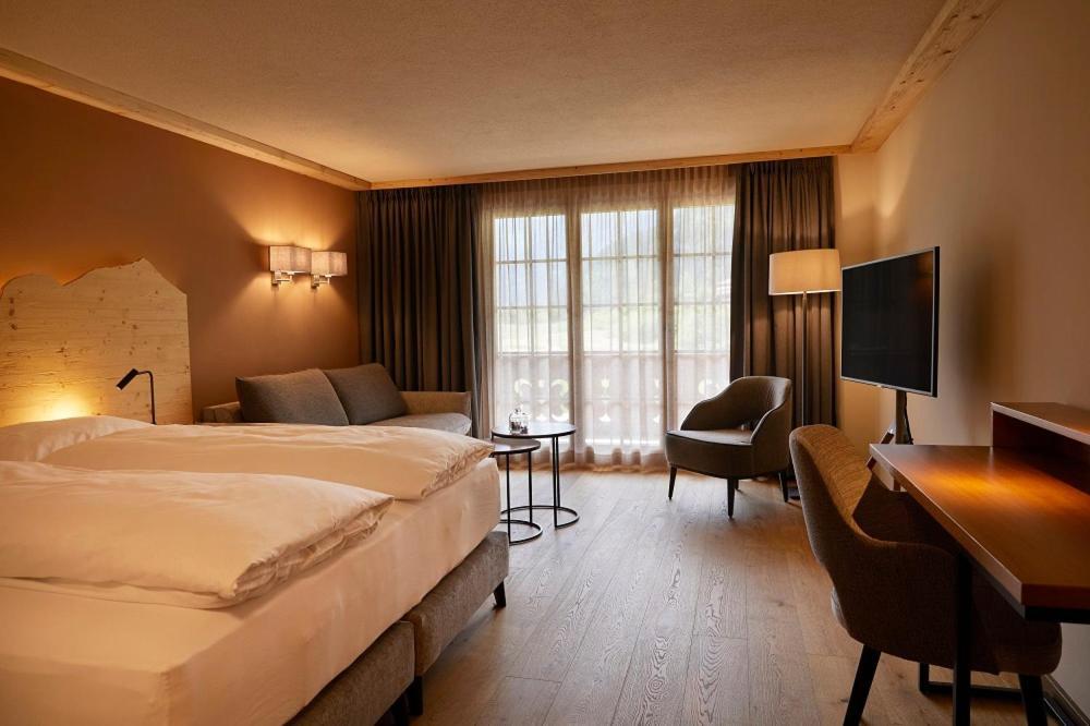 Hotel Alpenland Гштад Экстерьер фото